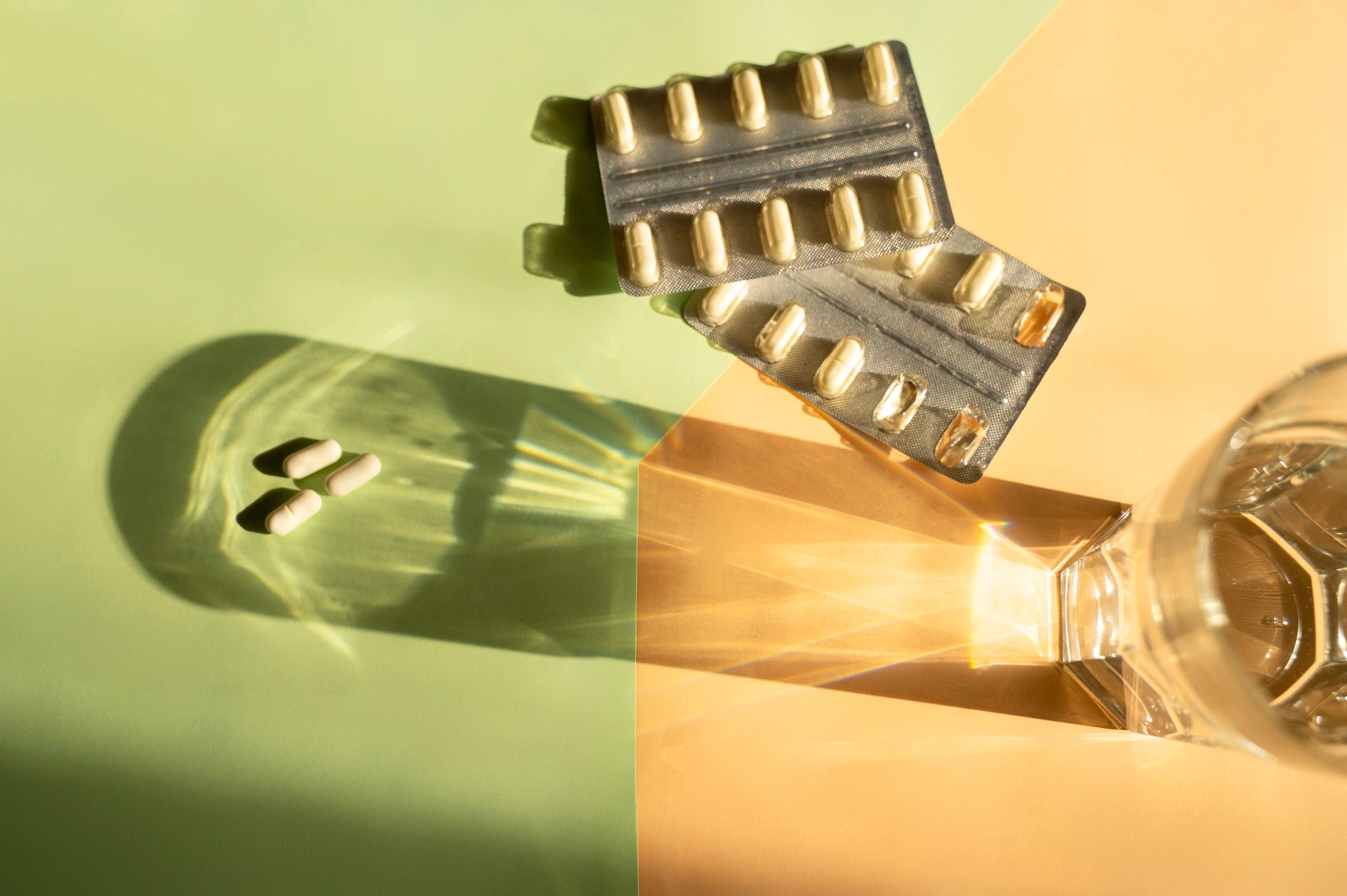 Wellness capsules and essentials displayed on a bright background