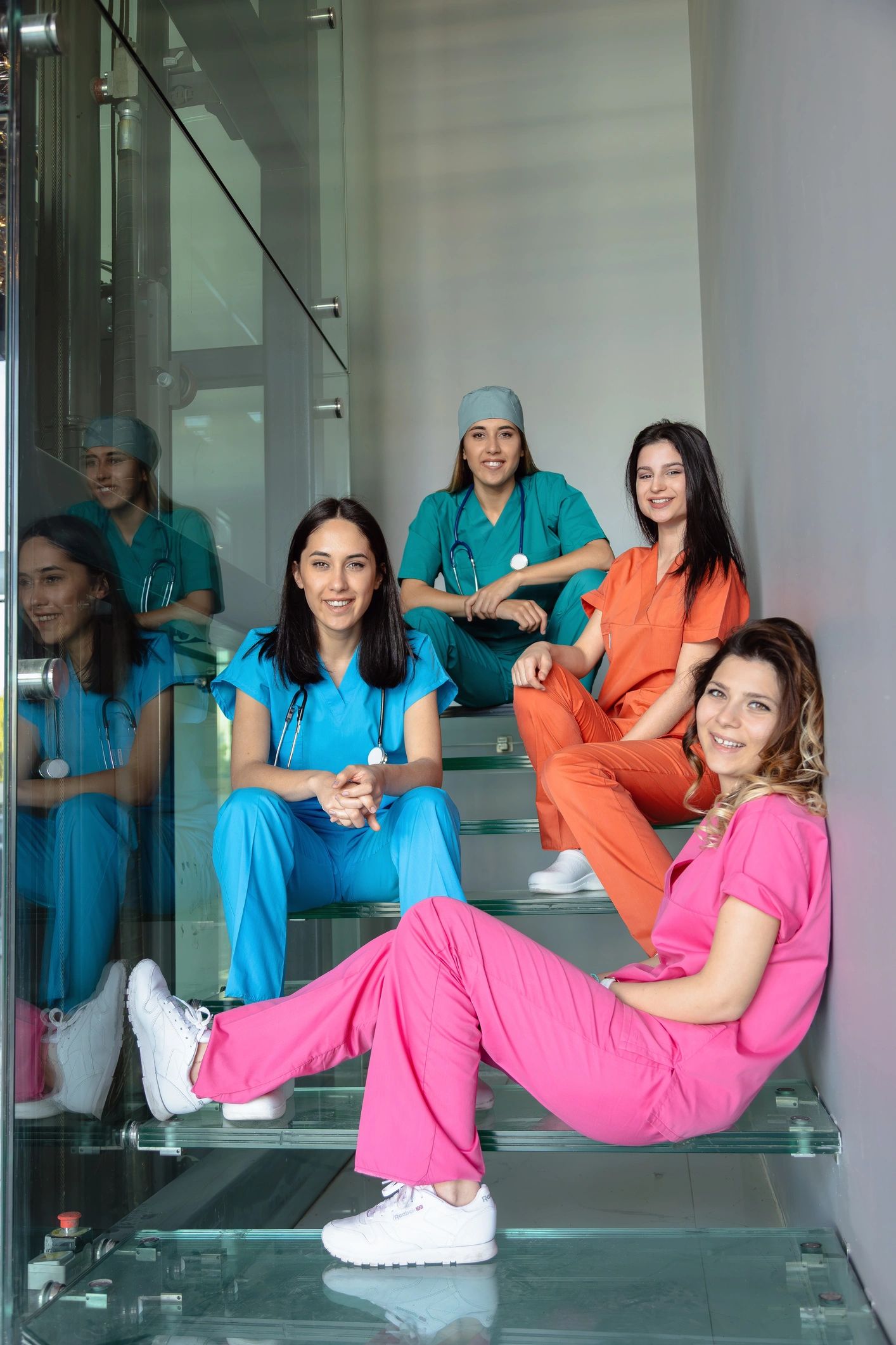Friendly wellness professionals seated together in a clinic