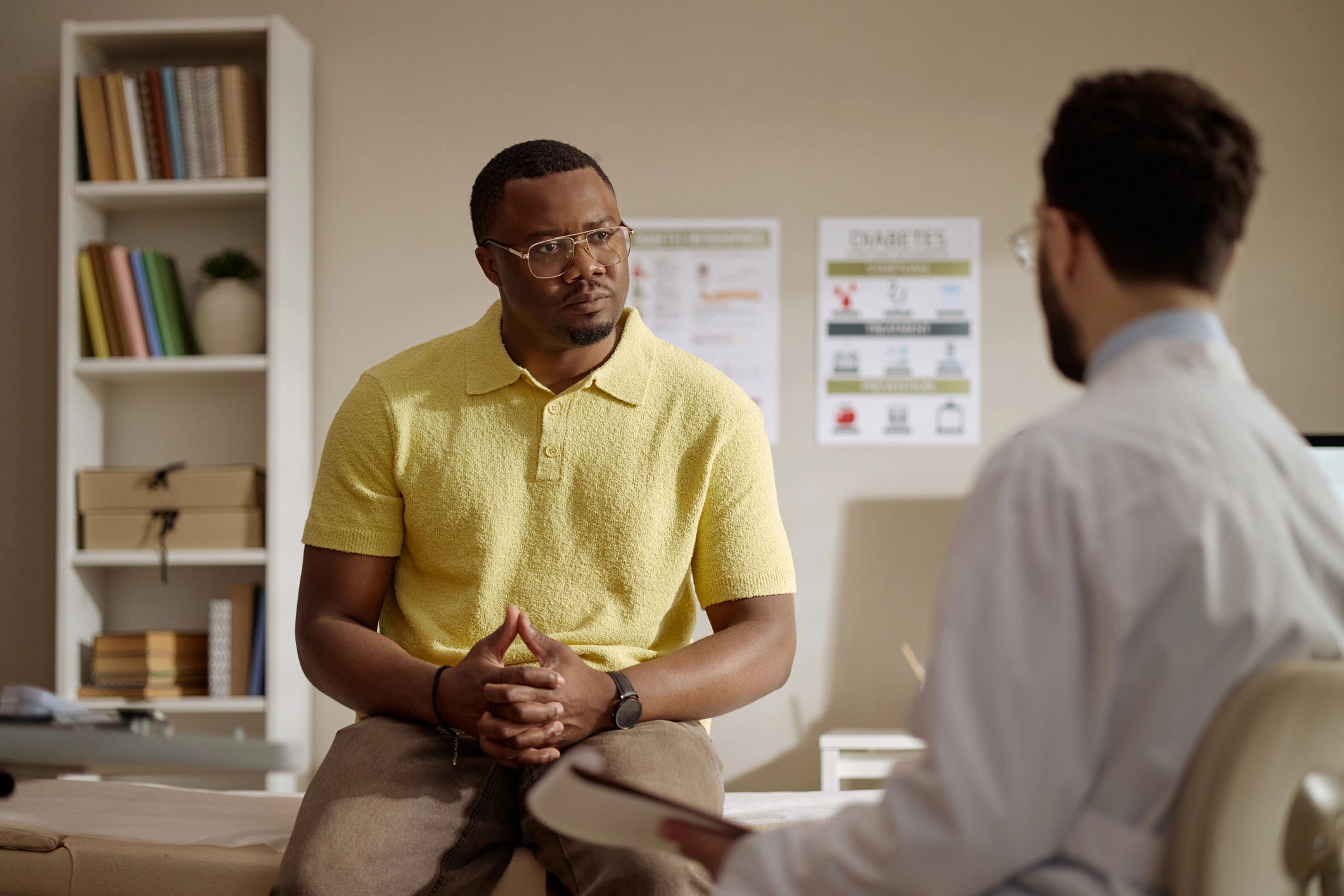 Doctor speaking with patient during a wellness consultation